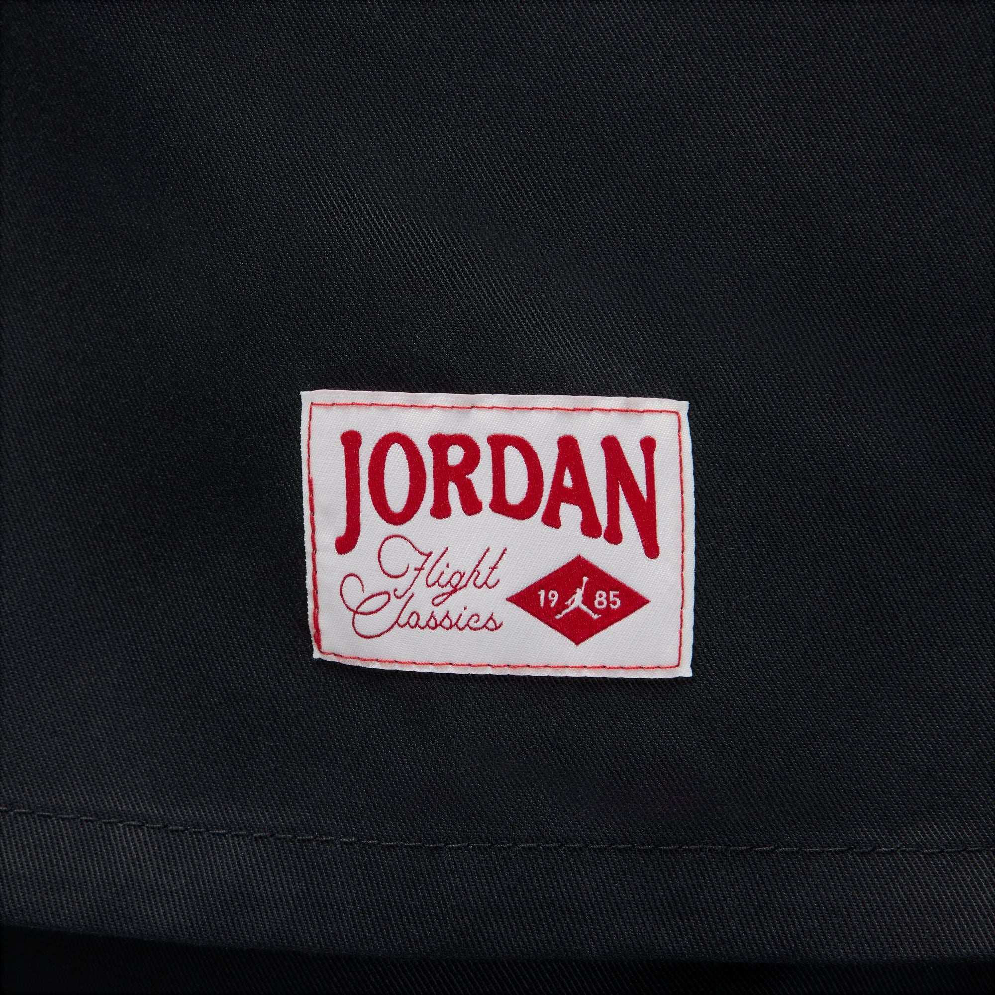 Jordan Women's Woven Solid Top