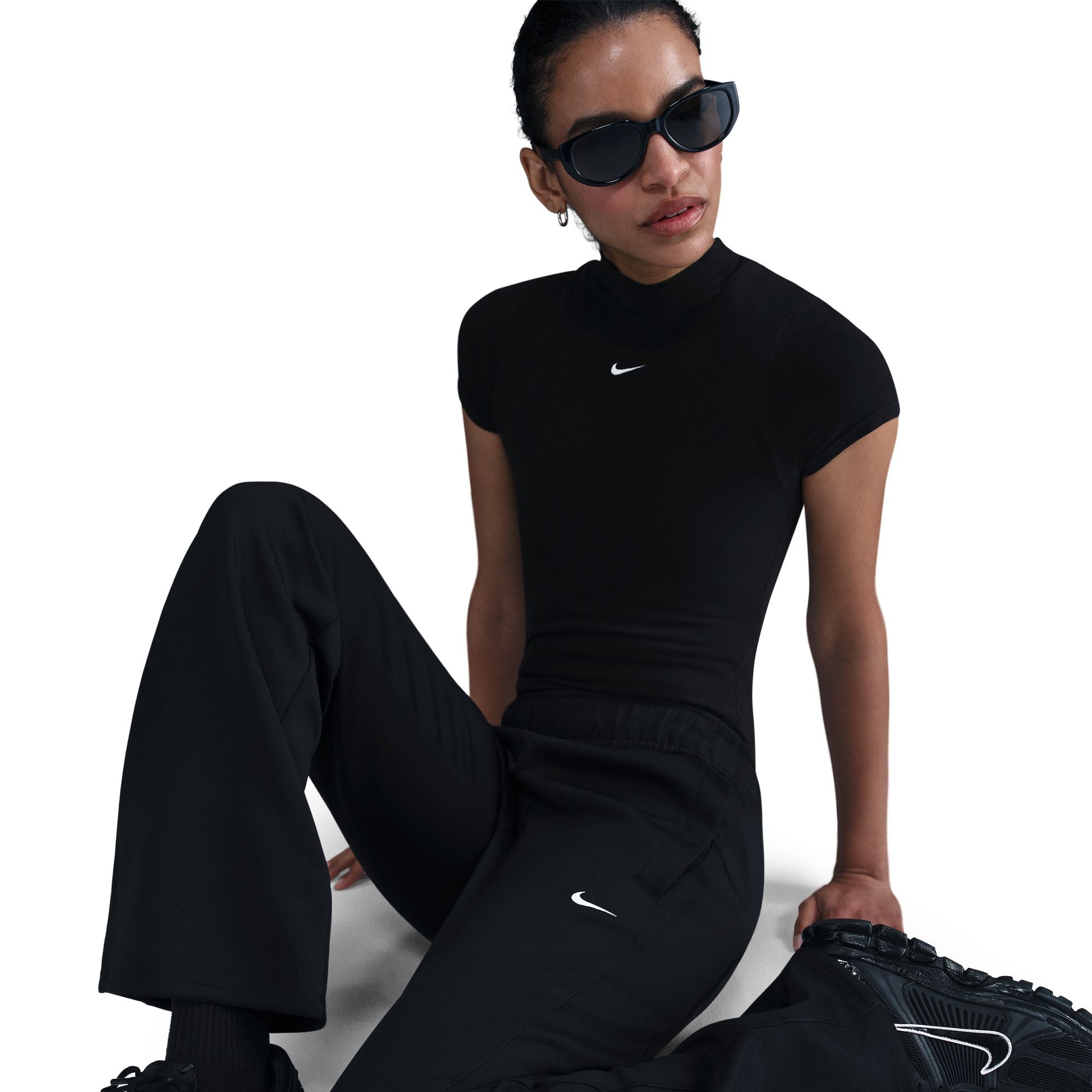 Nike Sportswear Windrunner Women's Mid-Rise Slim Knit Pants